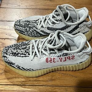 Yeezy Boost.  Zebra.  Used condition.  My son loved these sneakers!